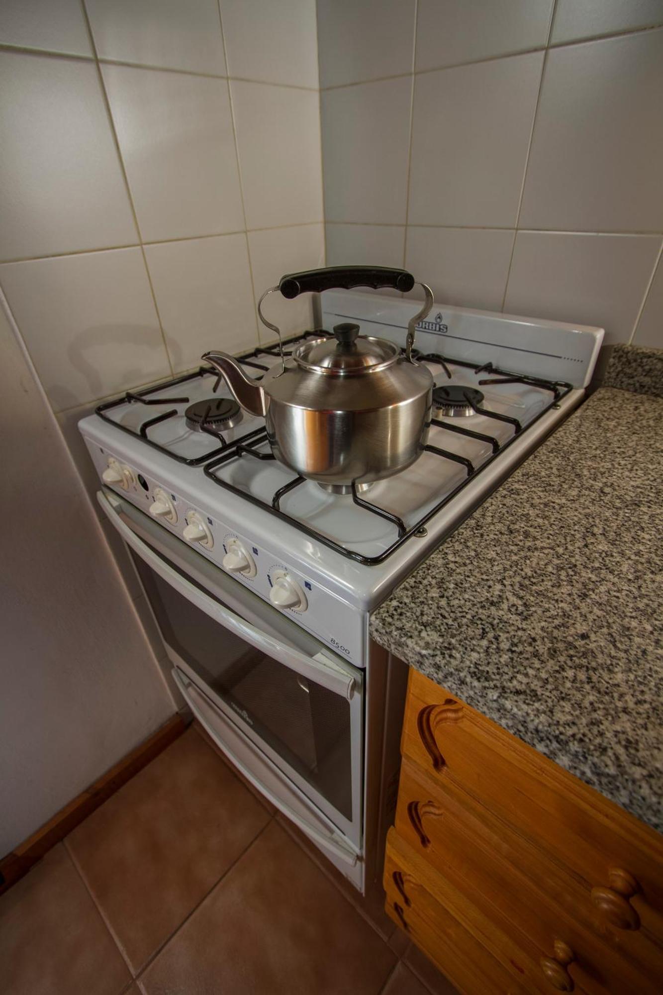 Melewe Aparthotel Villa La Angostura Quarto foto