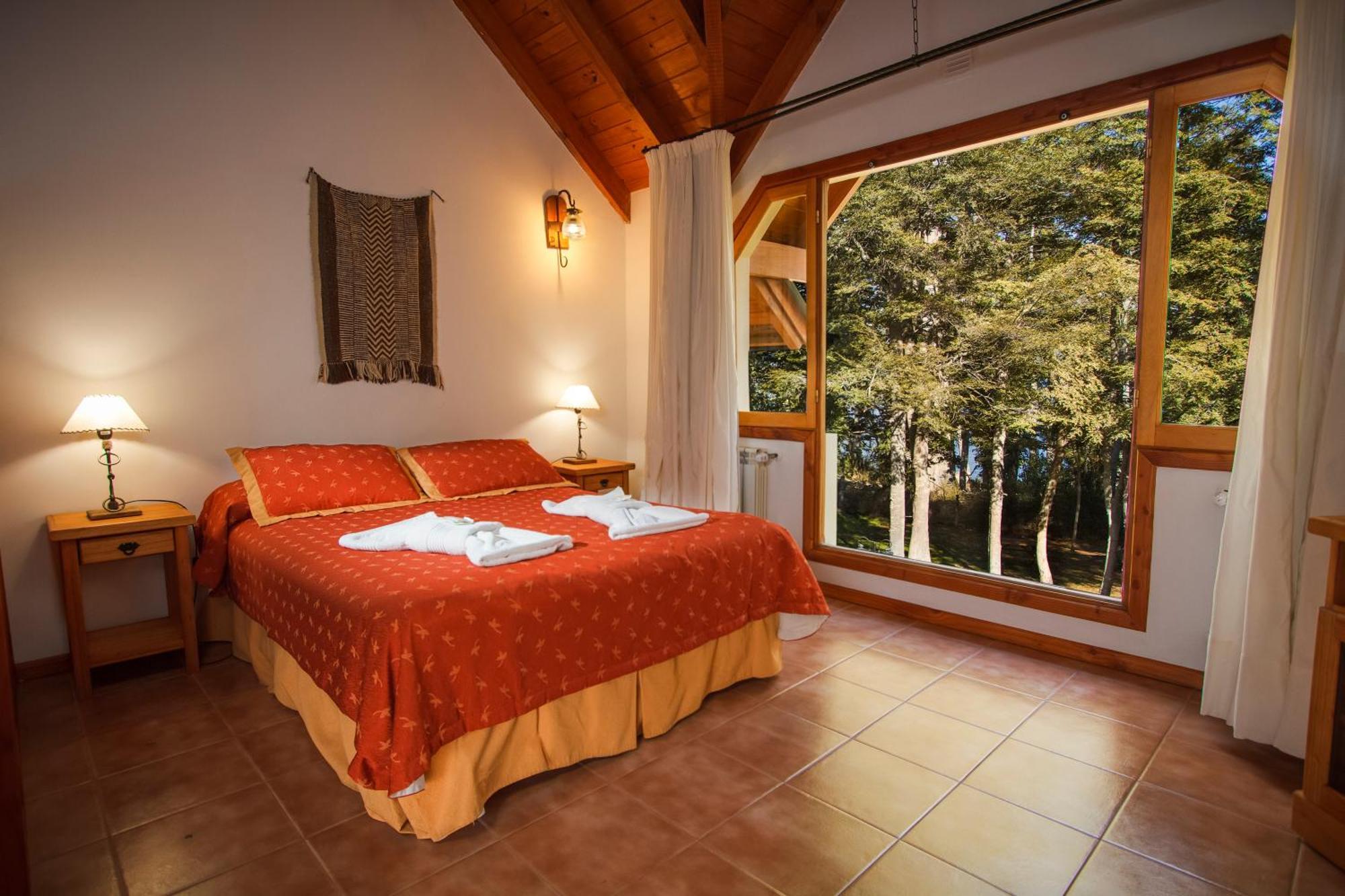 Melewe Aparthotel Villa La Angostura Quarto foto